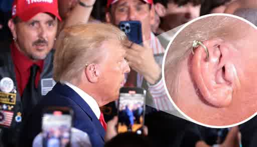 A fake picture of Donald Trump with an earring on the ear he was shot at.