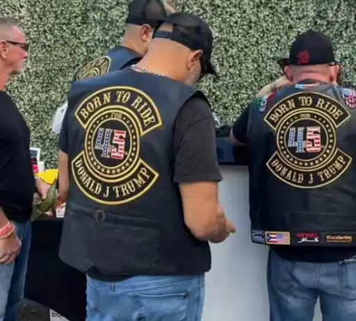 Trump supporters wearing a vest which says: Born to ride Donald J Trump